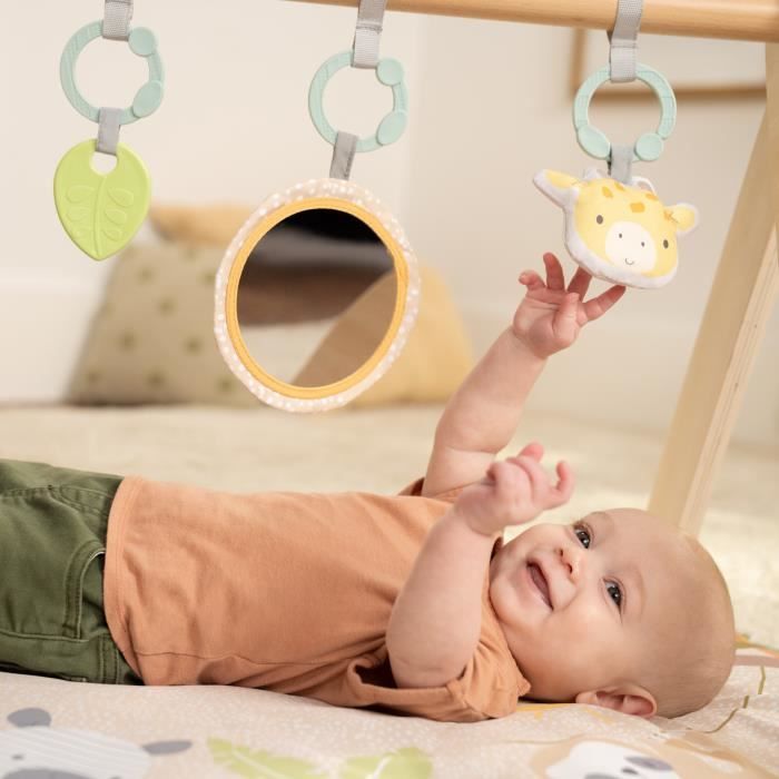 Alfombra de juego plegable para beb� INGENUITY WonderWood, redonda, con arco de madera, espejo y juguetes.